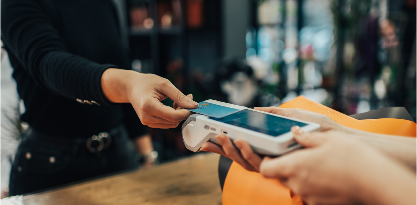 Customer entering card into card reader