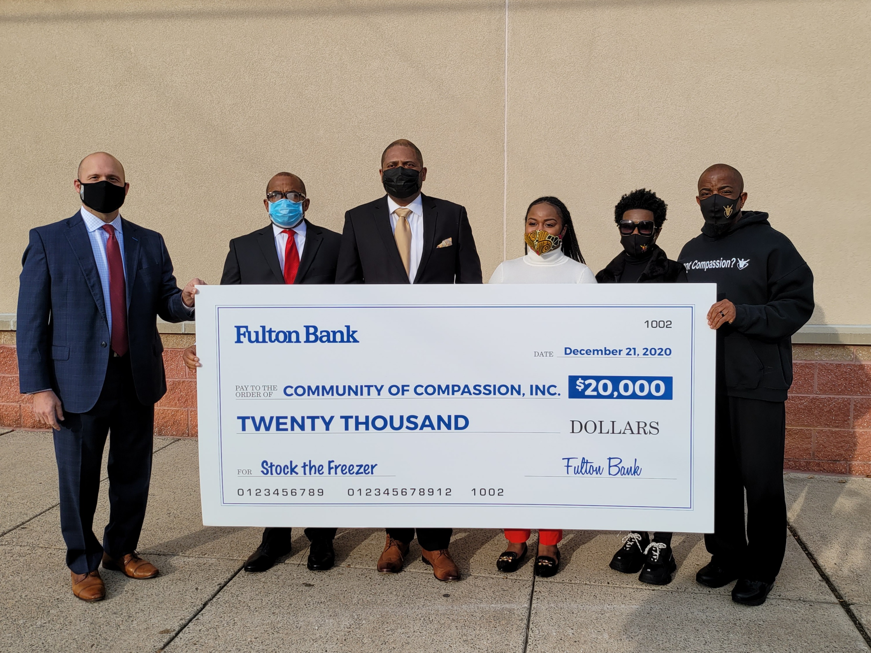 Fulton Bank check presentation for "Stock the Freezer" Initiative