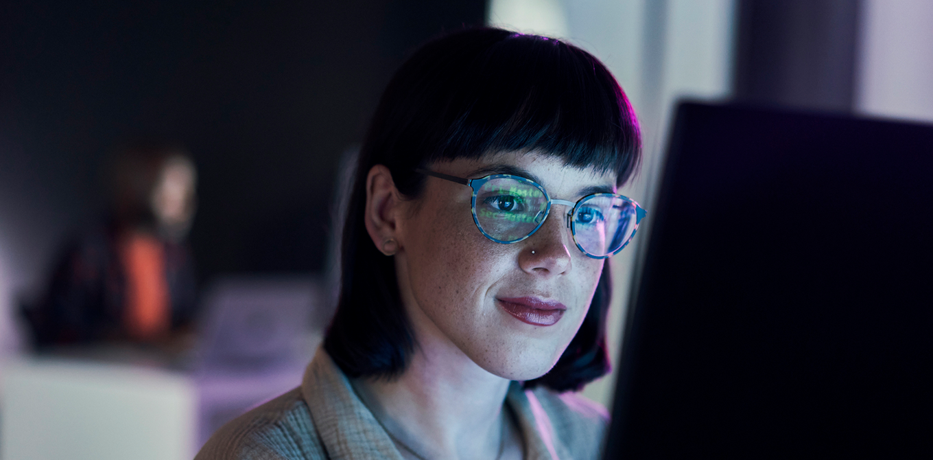 A small business owner reading about AI