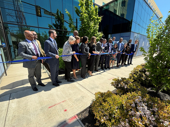Community leaders join with Fulton Bank team members to cut the ribbon on the new financial center and commercial banking office at Scott’s Addition. 